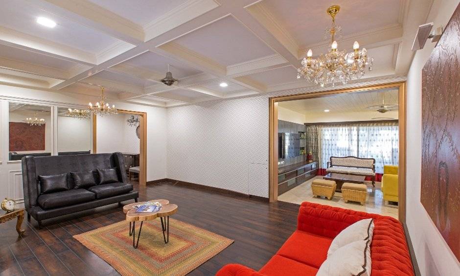 Drawing room interior design showing down false ceiling design for drawing room with chandelier to add contemporary look