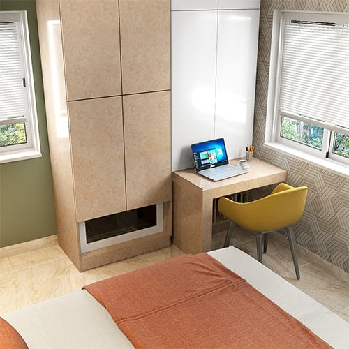 Budget interior designers in MG Road designed a wardrobe with a pull-out study table