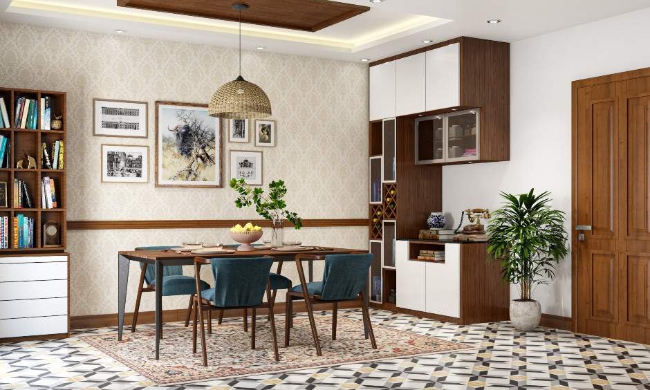 Dining room table in wood finished with four blue cushioned dining chairs and crockery unit
