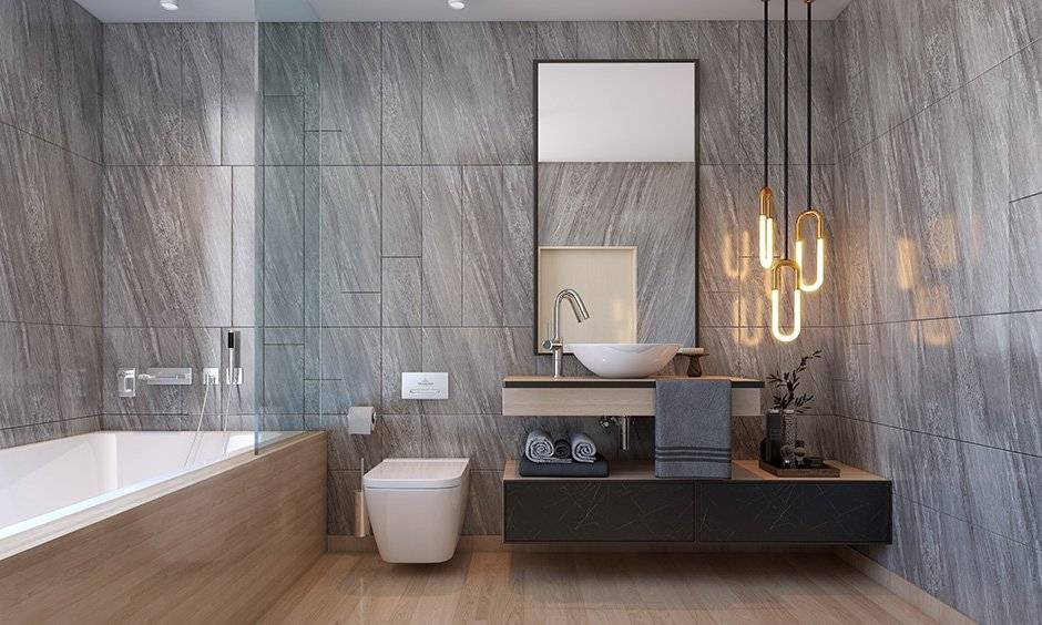 This modern bathroom has hanging led ceiling lights for the home next to the mirror that looks luxurious.