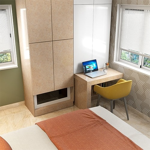 Home interior designers in Jayalakshmipuram designed a space saving wardrobe with pull-out study table