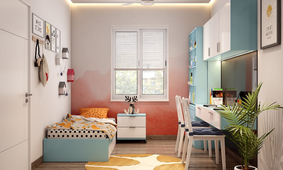 A kids' bedroom with blue and white furniture for two