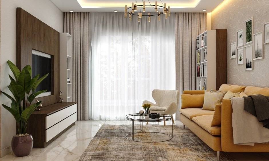 Living room design with yellow sofa in 1bhk house design