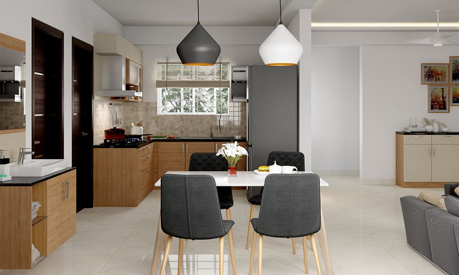 Luxury dining room design ideas with a sleek dining set in open kitchen cum dining area