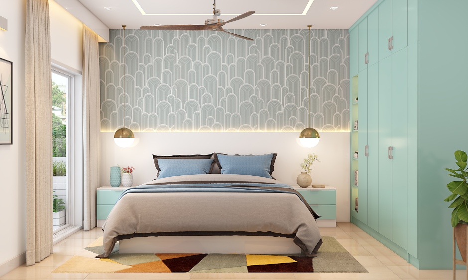 A modern bedroom design in blue and white featuring a queen-sized bed