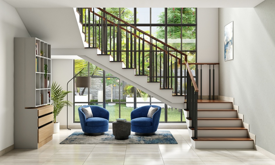 Modern staircase with wooden steps and metal railing showing staircase designs for homes based on different home sizes