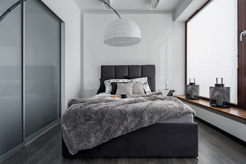 Modular wardrobes divide your walls with glass partition that divide a large room into different functional sections