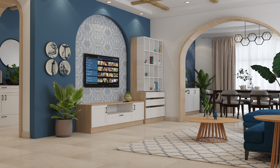 Living room has a Moroccan-style design and includes a modular TV unit and a tall bookshelf