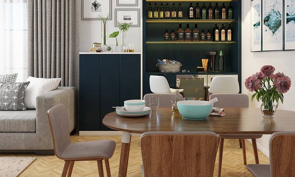 Open luxury living cum dining room with a dark-themed bar unit