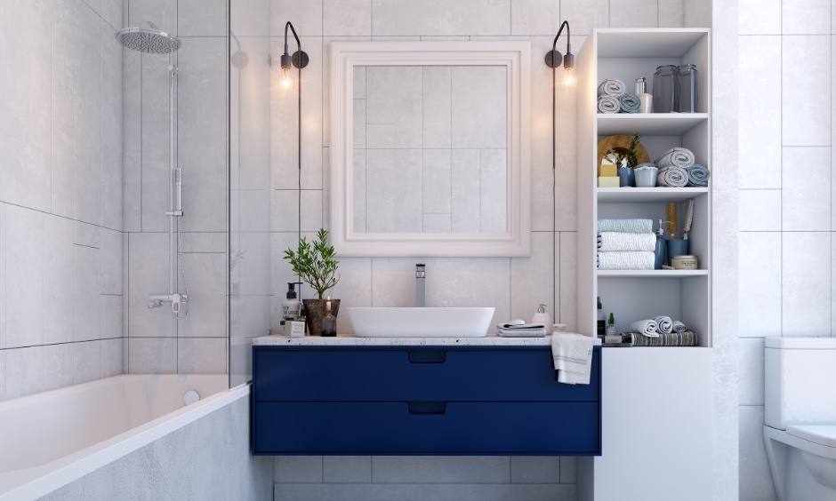 White bathroom design with bathtub, glass partition, and open box shelves for bathing essentials.